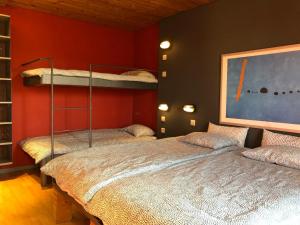 Postel nebo postele na pokoji v ubytování Holiday home Gite Saint Donat