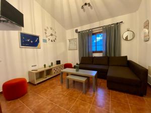 TV a/nebo společenská místnost v ubytování Casa El Descanso Azul A