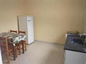 Virtuvė arba virtuvėlė apgyvendinimo įstaigoje Chalés Beira Rio
