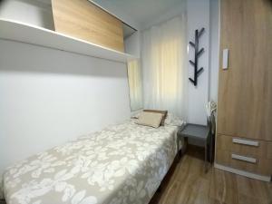 Postel nebo postele na pokoji v ubytování Apartamentos Medano - Lagos de Miramar Deluxe