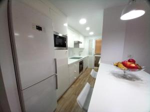 Kuchyň nebo kuchyňský kout v ubytování Apartamentos Medano - Lagos de Miramar Deluxe