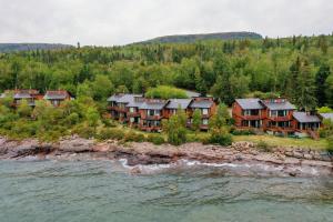 an aerial view of a house on the water at Lutsen Sea Villas in Lutsen