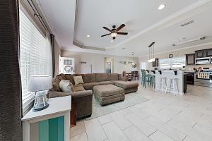a living room and kitchen with a couch and a table at Explore The World in Navarre