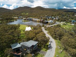 an aerial view of a town next to a lake at Les Perrieres Studio in Crackenback