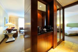 Posteľ alebo postele v izbe v ubytovaní Regent Warsaw Hotel