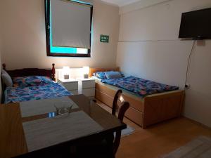 Cama o camas de una habitación en Apartmani Šević