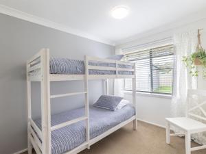 Ocean Palms 11 Prentice Place with a private pool客房内的一张或多张床位