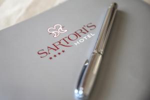Certifikát, hodnocení, plakát nebo jiný dokument vystavený v ubytování Sartori's Hotel