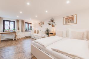 Postel nebo postele na pokoji v ubytování Konekt Apartment