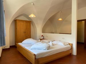 En eller flere senger på et rom på Gasthof Goldenes Lamm