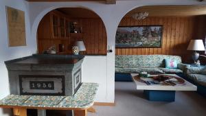 Posezení v ubytování Walser Chalet Casa Paterna