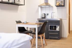 Dapur atau dapur kecil di Modernes Apartment in der Innenstadt +78 gambar