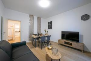 TV a/nebo společenská místnost v ubytování Boutique Apartments
