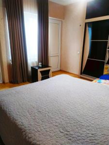 Ein Bett oder Betten in einem Zimmer der Unterkunft Guesthouse Family