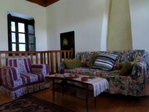 A seating area at Agroikia