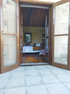 A bed or beds in a room at Agroikia