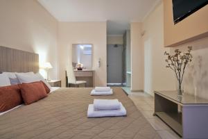 Voodi või voodid majutusasutuse Hotel Varres toas