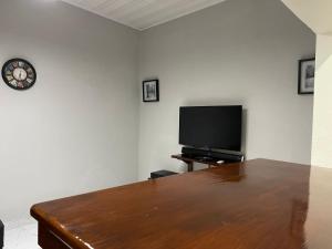 Televisyen dan/atau pusat hiburan di TD Guest House 5 Lite