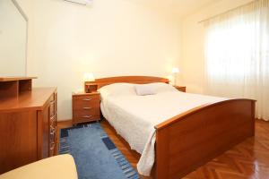 Postel nebo postele na pokoji v ubytování Holiday Home Bura