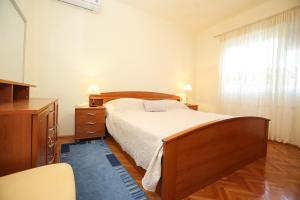 Postel nebo postele na pokoji v ubytování Holiday Home Bura