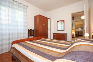Postel nebo postele na pokoji v ubytování Holiday Home Bura