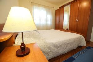 Postel nebo postele na pokoji v ubytování Holiday Home Bura