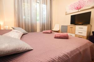 Postel nebo postele na pokoji v ubytování Holiday Home Bura