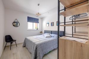 Postel nebo postele na pokoji v ubytování Chic 2BR Apartment, Ideal Location