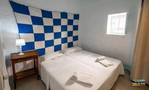 Postel nebo postele na pokoji v ubytování Casa AZUL