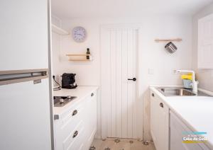 Kuchyň nebo kuchyňský kout v ubytování Casa AMARILLA