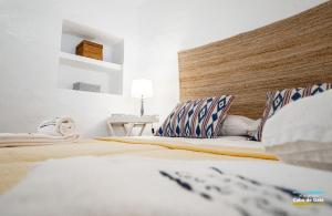 Postel nebo postele na pokoji v ubytování Casa AMARILLA