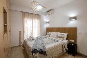 Posteľ alebo postele v izbe v ubytovaní Helen Luxury Holiday House with Sea View