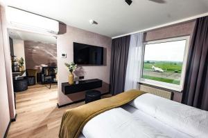 Postel nebo postele na pokoji v ubytování Sombea Donaueschingen