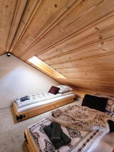 Posteľ alebo postele v izbe v ubytovaní Podhalańska Ostoja Apartament