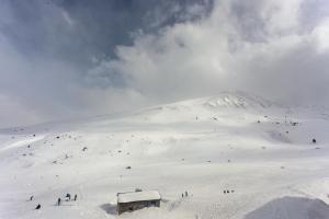 a group of people on a snow covered mountain at Gran Duc Pedrous in Pas de la Casa