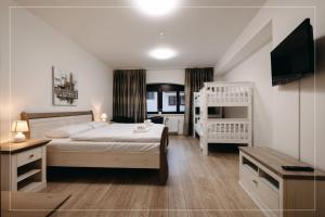 Postel nebo postele na pokoji v ubytování Wellness penzion Marta + 37 fotografií