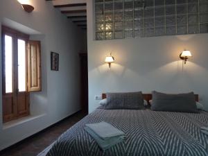Postel nebo postele na pokoji v ubytování Cortijo Urrá Manor House, Sorbas