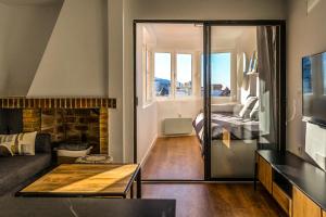 Postel nebo postele na pokoji v ubytování Apartamentos Sierra Nevada BlueTTravel - Zona baja