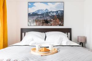 Posteľ alebo postele v izbe v ubytovaní Dom Pod Gubałówką - Zakopane Apartamenty