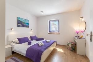 Posteľ alebo postele v izbe v ubytovaní Villa Blue Sky