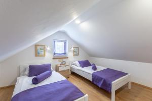 Posteľ alebo postele v izbe v ubytovaní Villa Blue Sky + 31 fotografií
