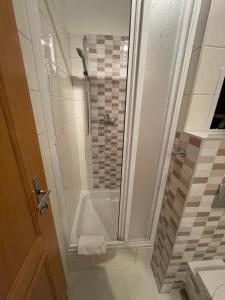 Koupelna v ubytování Apartmány U Pošty