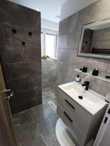 Koupelna v ubytování Apartmany Železná Ruda