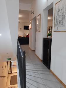 A kitchen or kitchenette at Buon Hotel Bologna Centro - Affittacamere - Self Check-In