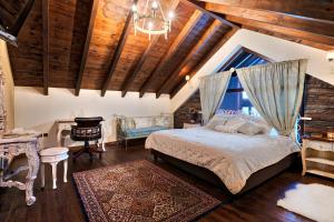 Posteľ alebo postele v izbe v ubytovaní Volhon Mansions of Parnassos