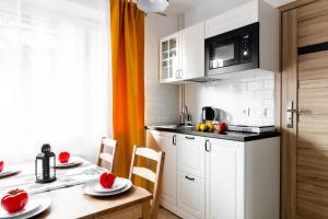 Kuchyňa alebo kuchynka v ubytovaní Dom Pod Gubałówką - Zakopane Apartamenty