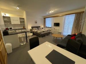 Kuchyň nebo kuchyňský kout v ubytování Apartmány U Pošty