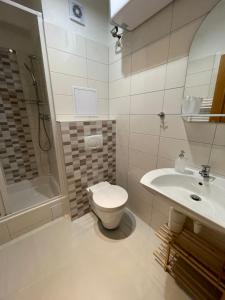 Koupelna v ubytování Apartmány U Pošty