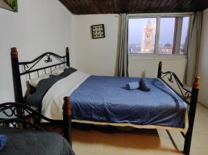 Postelja oz. postelje v sobi nastanitve New Citadel Hostel