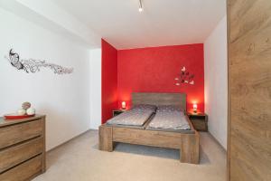 Postel nebo postele na pokoji v ubytování Saeli Apartments